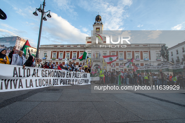 About 30,000 people with Palestinian and Lebanese flags walk the streets of Madrid, Spain, on October 5, 2024, to protest Israel's attacks o...