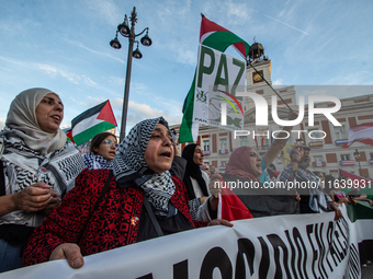 About 30,000 people with Palestinian and Lebanese flags walk the streets of Madrid, Spain, on October 5, 2024, to protest Israel's attacks o...