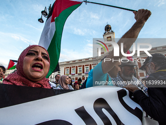 About 30,000 people with Palestinian and Lebanese flags walk the streets of Madrid, Spain, on October 5, 2024, to protest Israel's attacks o...