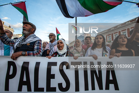 About 30,000 people with Palestinian and Lebanese flags walk the streets of Madrid, Spain, on October 5, 2024, to protest Israel's attacks o...