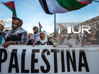 About 30,000 people with Palestinian and Lebanese flags walk the streets of Madrid, Spain, on October 5, 2024, to protest Israel's attacks o...