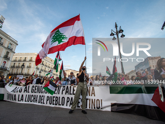 About 30,000 people with Palestinian and Lebanese flags walk the streets of Madrid, Spain, on October 5, 2024, to protest Israel's attacks o...