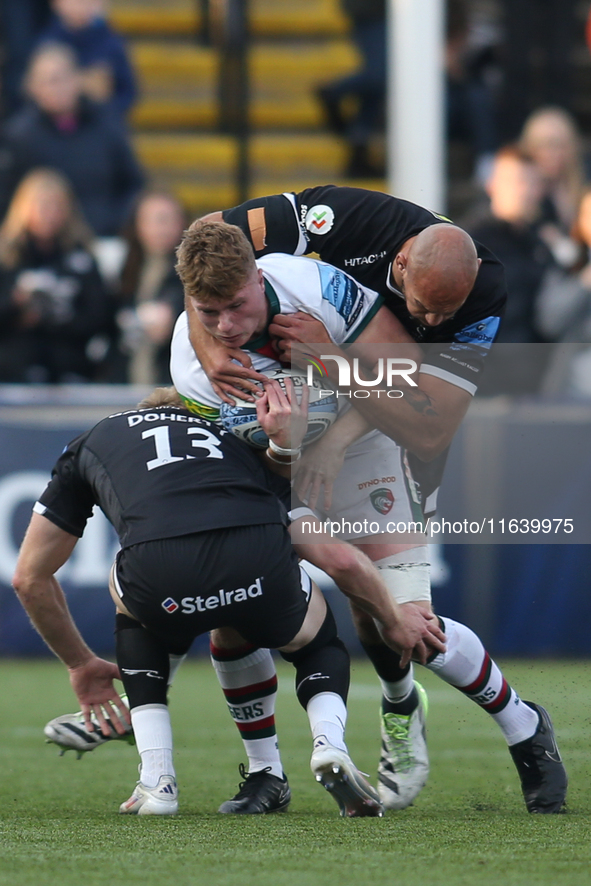 Leicester Tigers' Joseph Woodward is double tackled during the Gallagher Premiership match between Newcastle Falcons and Leicester Tigers at...