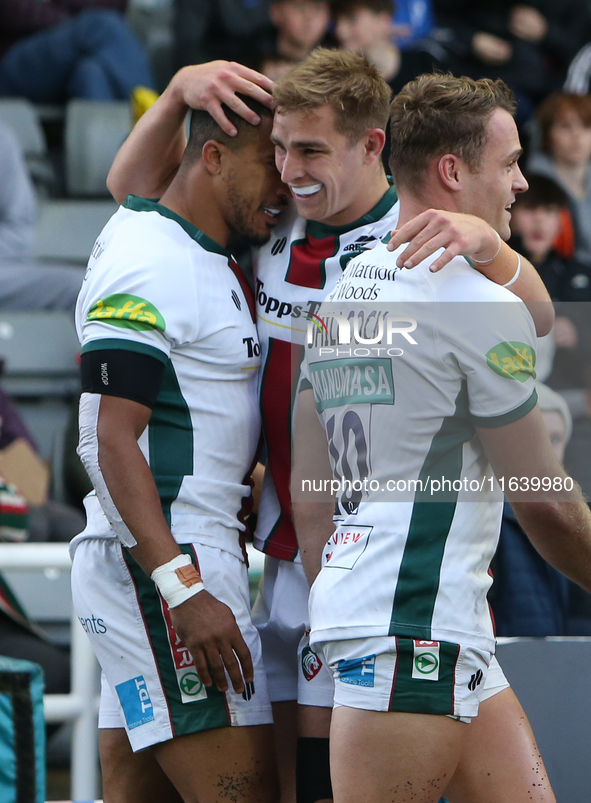 Leicester Tiger's Jack van Poortvliet congratulates Leicester Tiger's Anthony Watson on his try during the Gallagher Premiership match betwe...