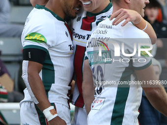 Leicester Tiger's Jack van Poortvliet congratulates Leicester Tiger's Anthony Watson on his try during the Gallagher Premiership match betwe...