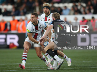 Leicester Tigers' Jamie Shillcock passes a ball under pressure during the Gallagher Premiership match between Newcastle Falcons and Leiceste...