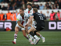 Leicester Tigers' Jamie Shillcock passes a ball under pressure during the Gallagher Premiership match between Newcastle Falcons and Leiceste...