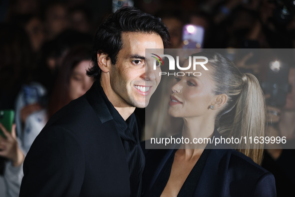 Kaka and Carolina Dias attend the Emporio Armani Fashion Show during the Milan Womenswear Spring/Summer 2025 in Milan, Italy, on September 1...