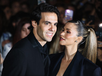 Kaka and Carolina Dias attend the Emporio Armani Fashion Show during the Milan Womenswear Spring/Summer 2025 in Milan, Italy, on September 1...