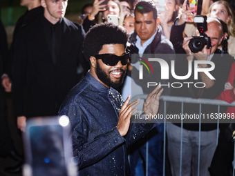 Khalid attends the Emporio Armani Fashion Show during the Milan Womenswear Spring/Summer 2025 in Milan, Italy, on September 19, 2024 (