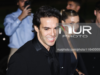 Kaka and Carolina Dias attend the Emporio Armani Fashion Show during the Milan Womenswear Spring/Summer 2025 in Milan, Italy, on September 1...