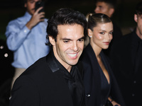 Kaka and Carolina Dias attend the Emporio Armani Fashion Show during the Milan Womenswear Spring/Summer 2025 in Milan, Italy, on September 1...