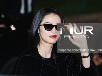 Zhou Yutong attends the Emporio Armani Fashion Show during the Milan Womenswear Spring/Summer 2025 in Milan, Italy, on September 19, 2024 (