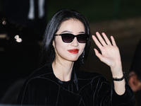 Zhou Yutong attends the Emporio Armani Fashion Show during the Milan Womenswear Spring/Summer 2025 in Milan, Italy, on September 19, 2024 (