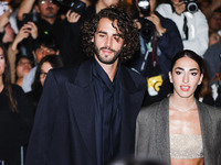 Gianmarco Tamberi and Chiara Bontempi attend the Emporio Armani Fashion Show during the Milan Womenswear Spring/Summer 2025 in Milan, Italy,...