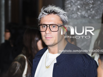 Nicolo Martinenghi attends the Emporio Armani Fashion Show during the Milan Womenswear Spring/Summer 2025 in Milan, Italy, on September 19,...