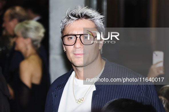 Nicolo Martinenghi attends the Emporio Armani Fashion Show during the Milan Womenswear Spring/Summer 2025 in Milan, Italy, on September 19,...