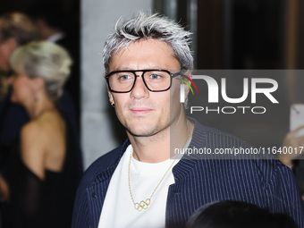 Nicolo Martinenghi attends the Emporio Armani Fashion Show during the Milan Womenswear Spring/Summer 2025 in Milan, Italy, on September 19,...