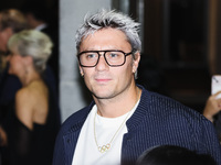 Nicolo Martinenghi attends the Emporio Armani Fashion Show during the Milan Womenswear Spring/Summer 2025 in Milan, Italy, on September 19,...