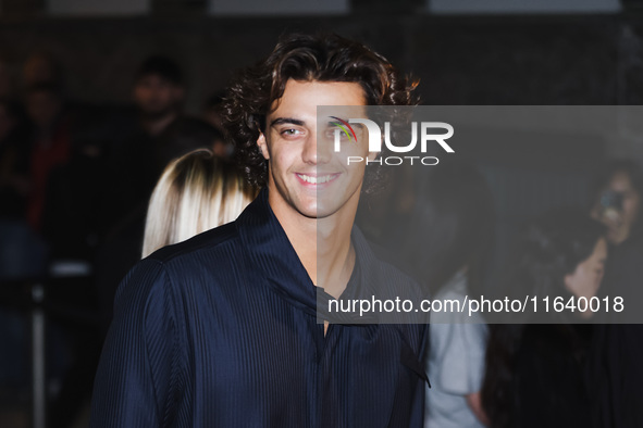 Thomas Ceccon attends the Emporio Armani Fashion Show during the Milan Womenswear Spring/Summer 2025 in Milan, Italy, on September 19, 2024 