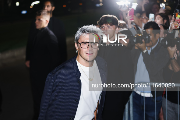 Nicolo Martinenghi attends the Emporio Armani Fashion Show during the Milan Womenswear Spring/Summer 2025 in Milan, Italy, on September 19,...