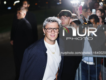 Nicolo Martinenghi attends the Emporio Armani Fashion Show during the Milan Womenswear Spring/Summer 2025 in Milan, Italy, on September 19,...