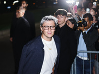 Nicolo Martinenghi attends the Emporio Armani Fashion Show during the Milan Womenswear Spring/Summer 2025 in Milan, Italy, on September 19,...