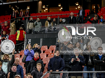 FC Utrecht fans hold the championship trophy during the match between Utrecht and RKC at Stadium de Galgenwaard for the 2024-2025 season in...