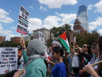 Hundreds of people join a demonstration in solidarity with the Palestinian people at The Grassy Knoll to mark the first anniversary of the w...