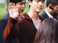 Jin of BTS attends the Gucci Fashion Show during the Milan Womenswear Spring/Summer 2025 in Milan, Italy, on September 27, 2024 (