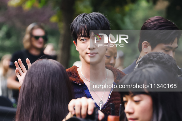 Jin of BTS attends the Gucci Fashion Show during the Milan Womenswear Spring/Summer 2025 in Milan, Italy, on September 27, 2024 