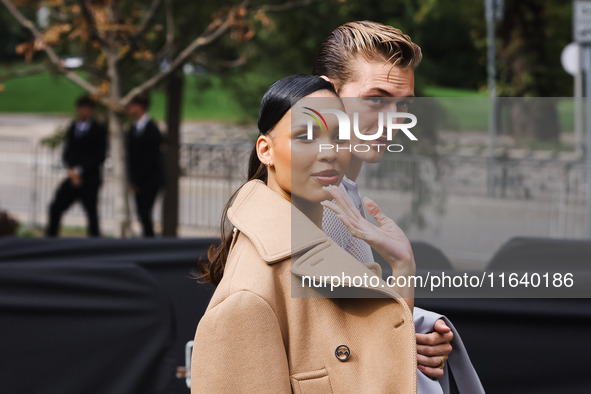 Nara Smith and Lucky Blue Smith attend the Gucci Fashion Show during the Milan Womenswear Spring/Summer 2025 in Milan, Italy, on September 2...