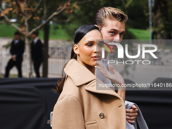 Nara Smith and Lucky Blue Smith attend the Gucci Fashion Show during the Milan Womenswear Spring/Summer 2025 in Milan, Italy, on September 2...