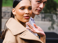 Nara Smith and Lucky Blue Smith attend the Gucci Fashion Show during the Milan Womenswear Spring/Summer 2025 in Milan, Italy, on September 2...