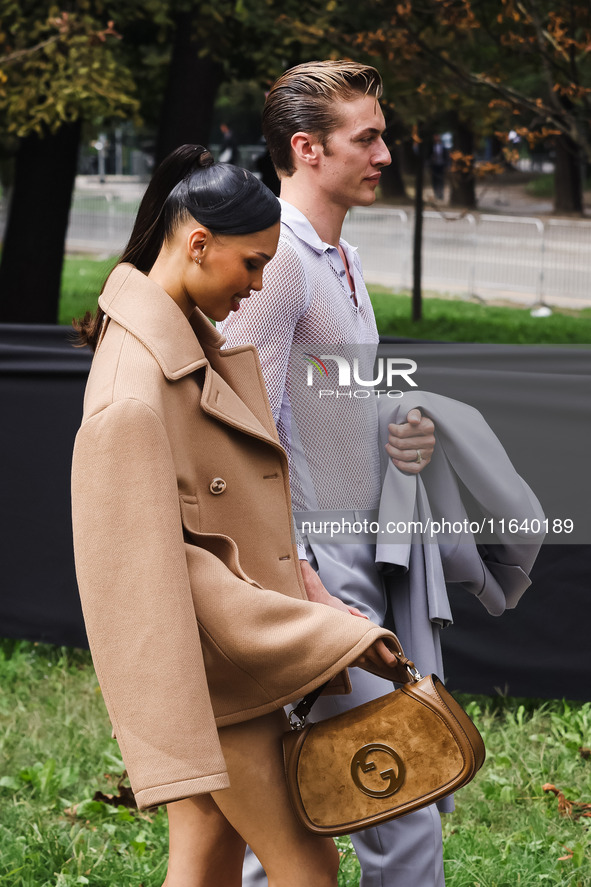 Nara Smith and Lucky Blue Smith attend the Gucci Fashion Show during the Milan Womenswear Spring/Summer 2025 in Milan, Italy, on September 2...