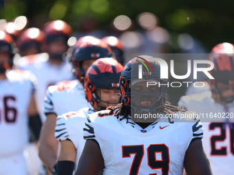 Princeton Tigers players come out on the field before the start of the NCAA football game against the Columbia Lions at Robert K. Kraft Fiel...