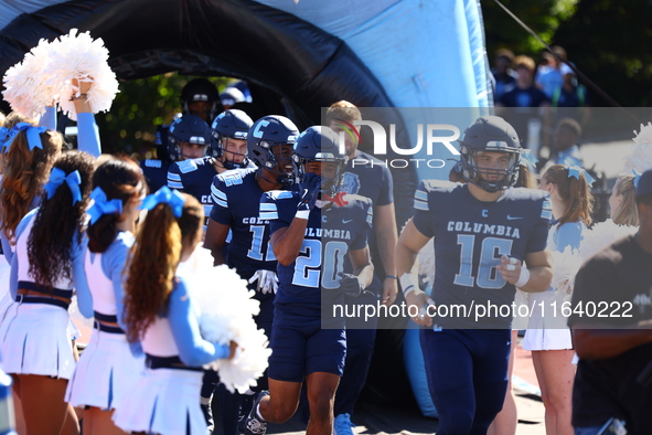 Columbia Lions players head out onto the field before the start of the NCAA football game against the Princeton Tigers at Robert K. Kraft Fi...