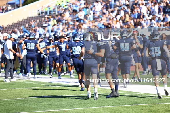 Columbia Lions quarterback Cole Freeman #4 celebrates a touchdown with teammates during the NCAA football game against the Princeton Tigers...