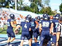 Columbia Lions quarterback Cole Freeman #4 celebrates a touchdown with teammates during the NCAA football game against the Princeton Tigers...