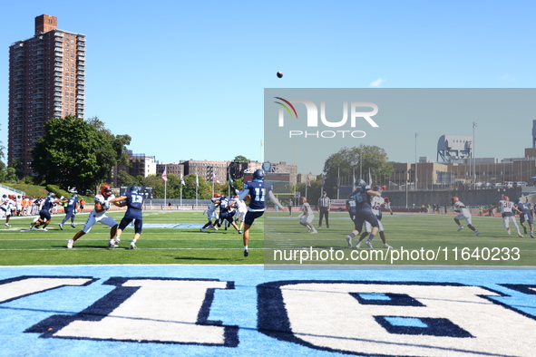 Columbia Lions punter William Hughes #11 kicks the ball downfield during the NCAA football game against the Princeton Tigers at Robert K. Kr...