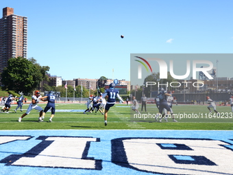 Columbia Lions punter William Hughes #11 kicks the ball downfield during the NCAA football game against the Princeton Tigers at Robert K. Kr...