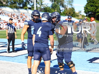 Columbia Lions quarterback Cole Freeman #4 celebrates a touchdown with teammates during the NCAA football game against the Princeton Tigers...