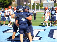 Columbia Lions quarterback Cole Freeman #4 celebrates a touchdown with teammates during the NCAA football game against the Princeton Tigers...