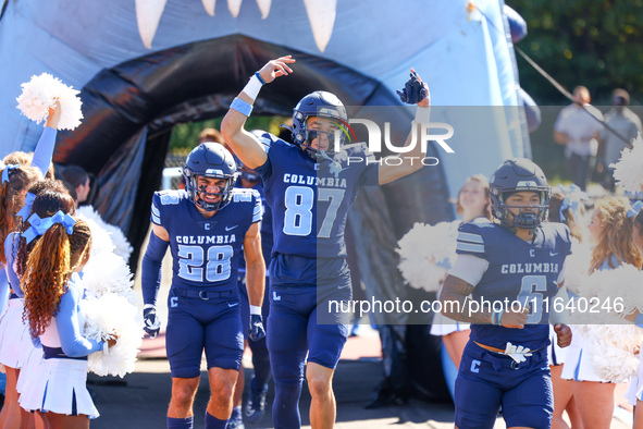 Columbia Lions players head out onto the field before the start of the NCAA football game against the Princeton Tigers at Robert K. Kraft Fi...