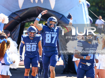 Columbia Lions players head out onto the field before the start of the NCAA football game against the Princeton Tigers at Robert K. Kraft Fi...