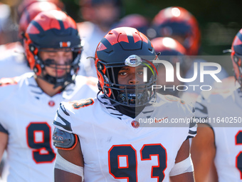 Princeton Tigers players come out on the field before the start of the NCAA football game against the Columbia Lions at Robert K. Kraft Fiel...