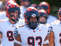 Princeton Tigers players come out on the field before the start of the NCAA football game against the Columbia Lions at Robert K. Kraft Fiel...