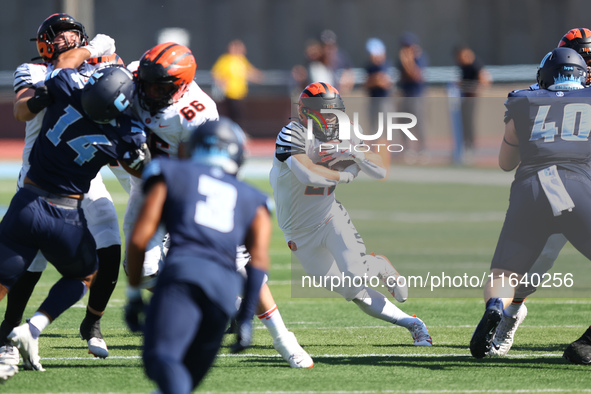 Princeton Tigers running back Ethan Clark #21 participates in the NCAA football game against the Columbia Lions at Robert K. Kraft Field at...