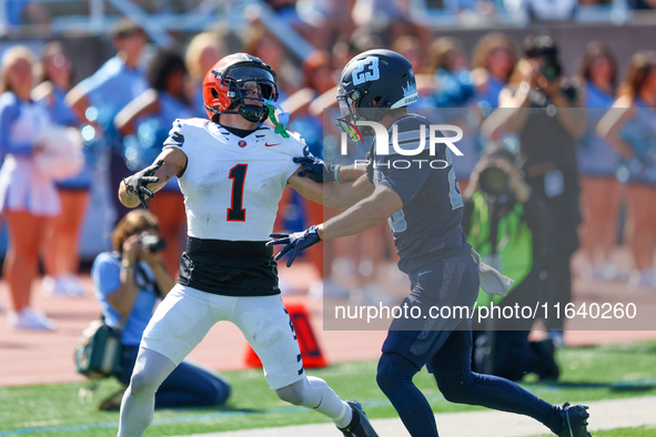 Princeton Tigers defensive back Casey Etienne Jr. #1 searches for the thrown ball in the end zone as Columbia Lions defensive back Carter Mc...