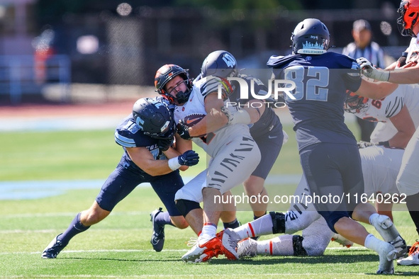 Princeton Tigers running back John Volker #2 is wrapped up by the Columbia defense during the NCAA football game against the Columbia Lions...